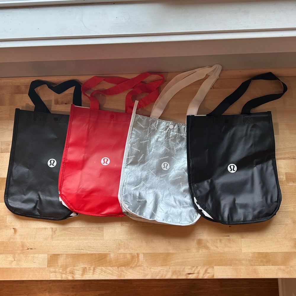 BUNDLE: Four Small Lululemon Shopping bags: Red, 2 Black/white, silver